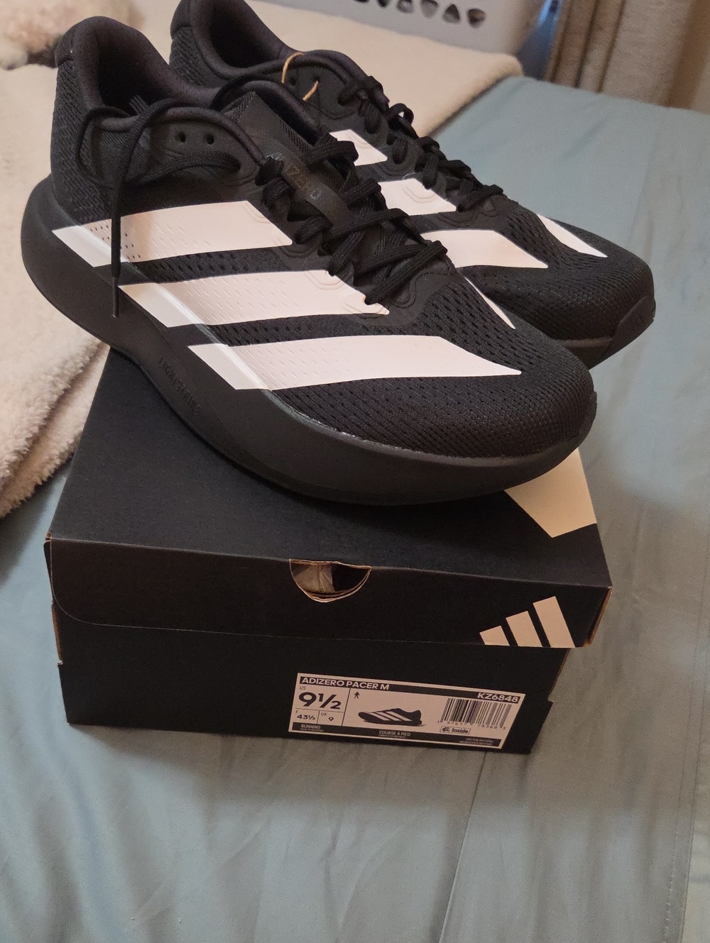 adidas Black Athletic Trainers with White Stripes